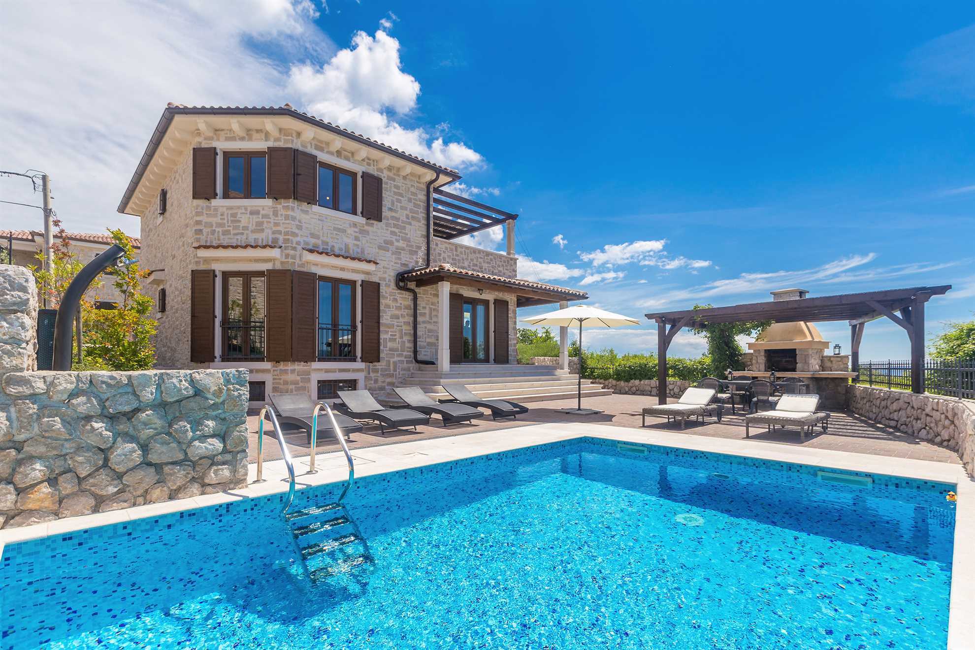 Villa CAVALLO with heated pool and sea view
