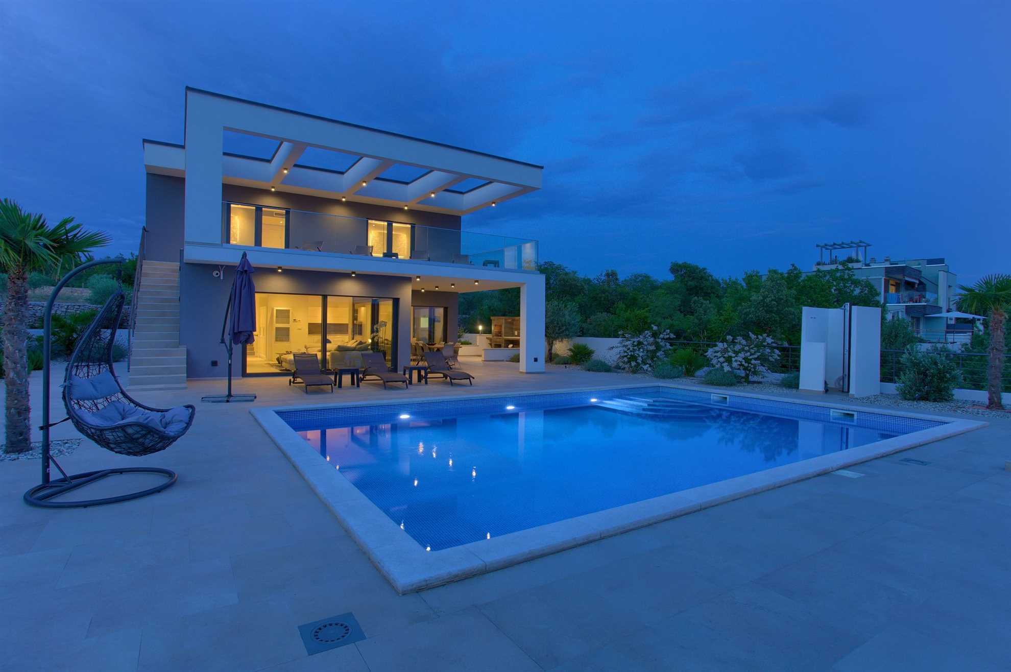 Villa QUADRA con piscina riscaldata